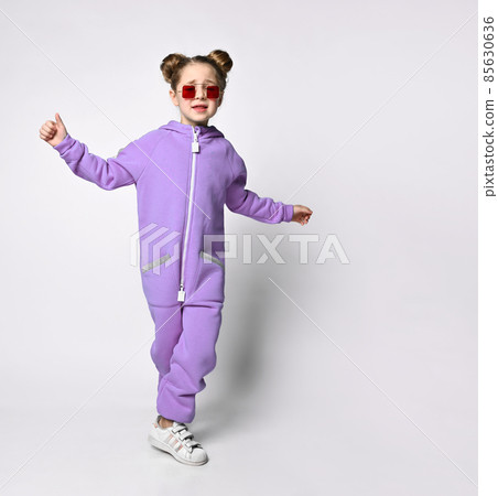 little preschooler girl in a warm blue sports 85630636