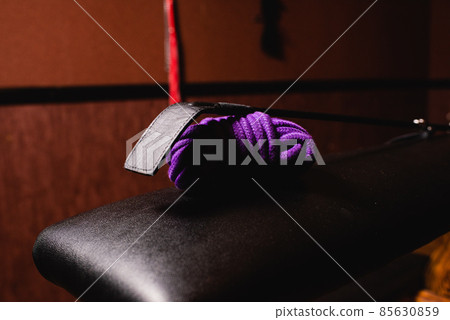 A coil of shibari rope with a stack. 85630859