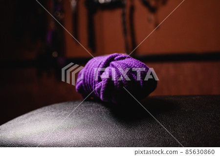 A coil of shibari rope with a stack. 85630860