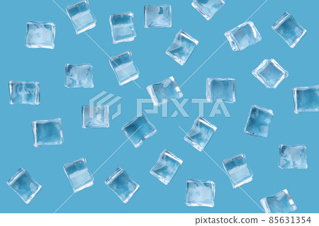 A pattern of randomly placed ice cubes on a blue background with a place for text. A pattern of randomly placed ice cubes on a blue background with a place for text. 85631354