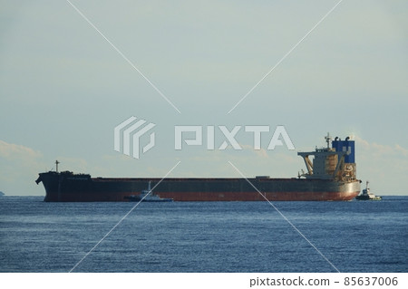 Tanker towed by tugboat Tanker towed by tugboat 85637006