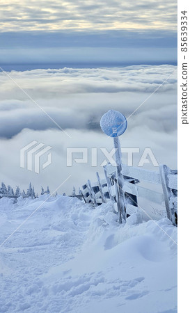 Ski or snowboard on chairlift at Big White Resort, 85639334