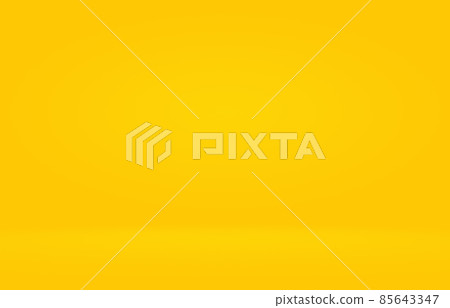 Abstract solid of shining yellow gradient studio wall room background. Abstract solid of shining yellow gradient studio wall room background. 85643347