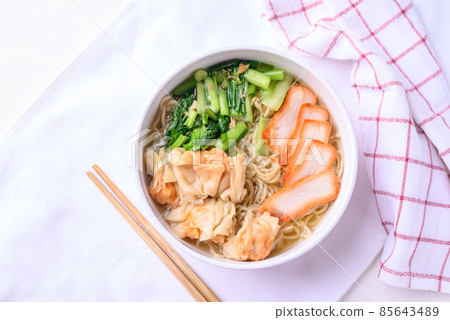 Noodles soup with wonton dumpling and grilled red pork, Asian food, Top view 85643489