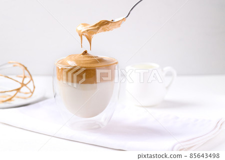 Dalgona coffee, Fluffy cream coffee whipping on cold or hot milk, Korean coffee style, Homemade food 85643498