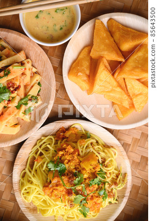 Deep fried Burmese tofu, spicy fresh Burmese tofu salad and noodles 85643500