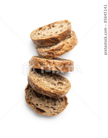 Wholegrain ciabatta bread. Sliced baked baguette. 85645141