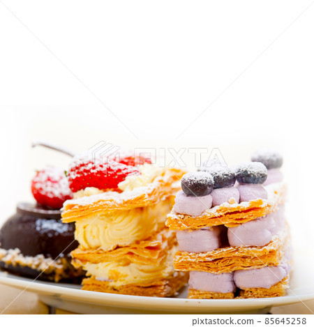 selection of fresh cream cake dessert plate selection of fresh cream cake dessert plate 85645258