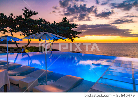Sunset at the edge of a swimming pool at Kata beach in Phuket province, in Thailand 85646479