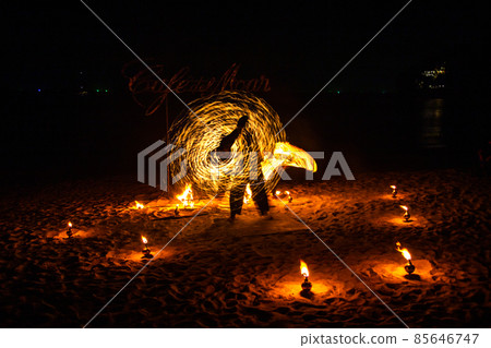 Fire show on the beach at night in Phuket, Thailand 85646747