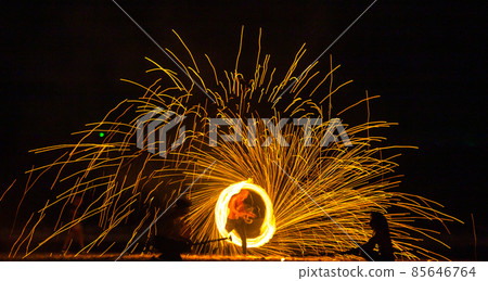 Fire show on the beach at night in Phuket, Thailand 85646764