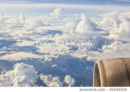 Aerial picture of clouds from airplane with airplane engine 85646920