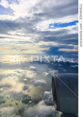 Aerial picture of clouds from airplane with airplane engine 85646922