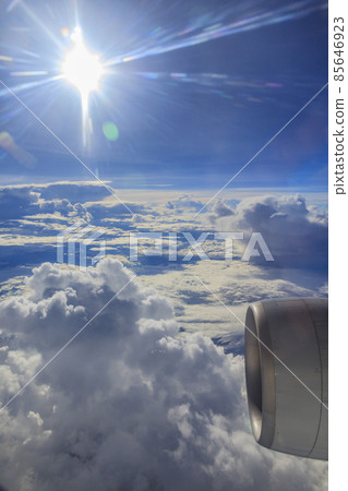 Aerial picture of clouds from airplane with airplane engine 85646923