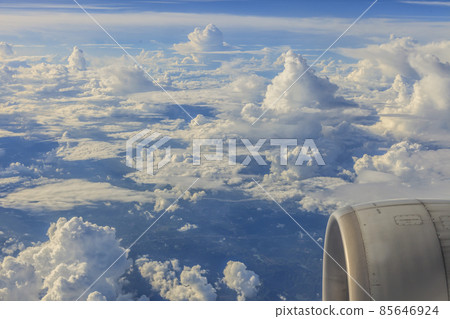 Aerial picture of clouds from airplane with airplane engine 85646924