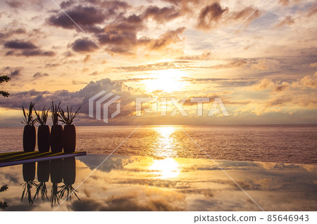 Sunset at the edge of a swimming pool at Kata beach in Phuket province, in Thailand 85646943