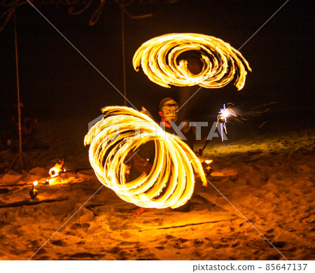 Fire show on the beach at night in Phuket, Thailand 85647137