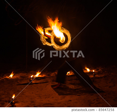Fire show on the beach at night in Phuket, Thailand Fire show on the beach at night in Phuket, Thailand 85647258
