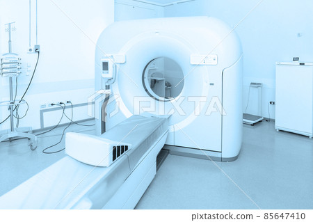 Medical CT or MRI Scan in the modern hospital laboratory. Interior of radiography department. Technologically advanced equipment in white room. Magnetic resonance diagnostics machine. Medical CT or MRI Scan in the modern hospital laboratory. Interior of radiography department. Technologically advanced equipment in white room. Magnetic resonance diagnostics machine. 85647410