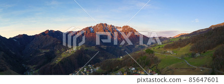 Wonderful panorama of the Seriana valley and its mountains at sunrise Wonderful panorama of the Seriana valley and its mountains at sunrise 85647601