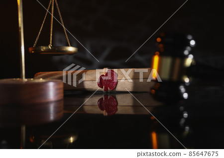Document with wax seal, scales and antique stamp on a desk. Last will and legacy concept Document with wax seal, scales and antique stamp on a desk. Last will and legacy concept 85647675