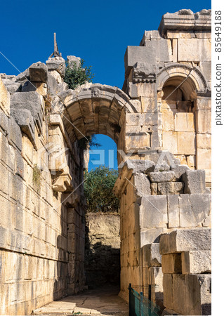 ruins of ancient theater in Myra (Demre, Turkey), from behind is a layer of earth deposited over time 85649188