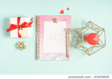 Flat lay of blank letter note pad with Valentine gift. Flat lay of blank letter note pad with Valentine gift. 85649699