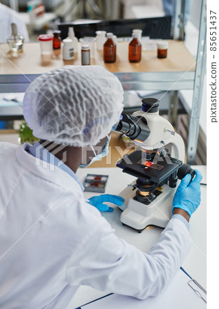 Doctor examining medical sample at office 85651437