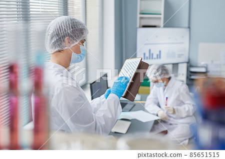 Scientist using tablet pc at the lab Scientist using tablet pc at the lab 85651515