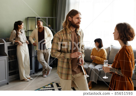 People talking during home party People talking during home party 85651593