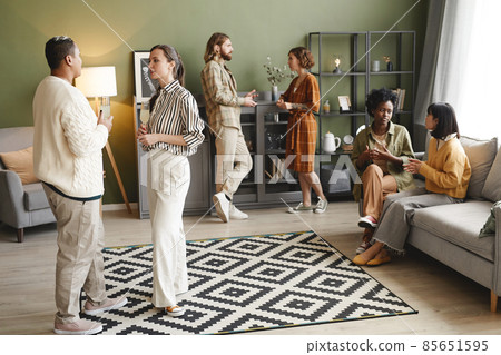 Group of people visiting home party Group of people visiting home party 85651595