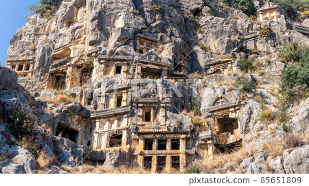 ancient tombs carved into the rocks in the ruins of Myra 85651809