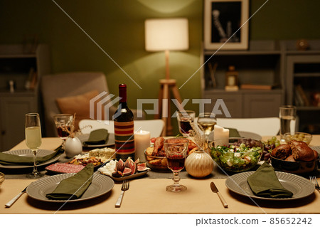Dining table with food in the living room 85652242
