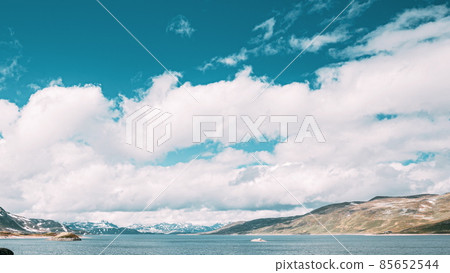 Oppland, Tyin Lake, Norway. Stones On Coast Of Beautiful Lake Tyin In Summer Day. Norwegian Nature. 4K 85652544