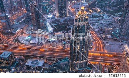 Dubai, UAE, United Arab Emirates. Hyperlaps Day To Night . City Traffic. Elevated View Cityscape Skyline Big City. Skyscraper in Many Light Lighting. Evening to Night 85652553