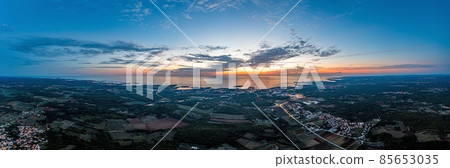 Drone panorama over Istrian Adriatic coast near Porec taken from high altitude at sunset 85653035