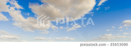 Image of a partly cloudy and partly clear sky during the day Image of a partly cloudy and partly clear sky during the day 85653090