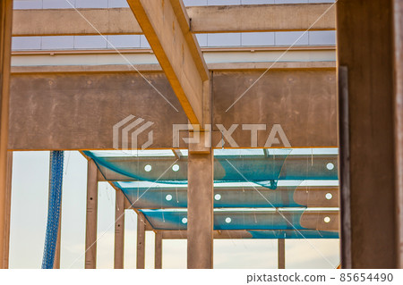 Construction site with precast concrete columns, beams and walls Construction site with precast concrete columns, beams and walls 85654490