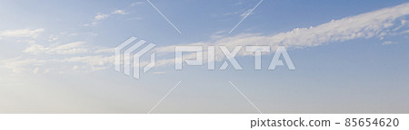Image of a partly cloudy and partly clear sky during the day Image of a partly cloudy and partly clear sky during the day 85654620
