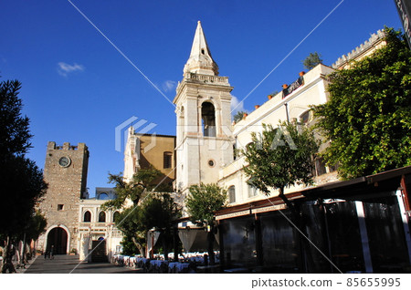 Italy, Sicily, Taormina, April 9 Square, Clock Tower (Mezzo Gate), Church of San Giuseppe Italy, Sicily, Taormina, April 9 Square, Clock Tower (Mezzo Gate), Church of San Giuseppe 85655995