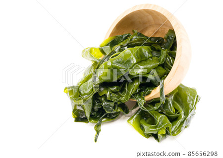 Fresh seaweed wakame isolated on white background. Copy space. Japanese food Fresh seaweed wakame isolated on white background. Copy space. Japanese food 85656298