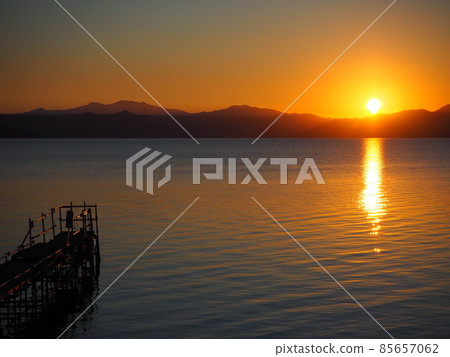 The sun setting over Lake Shikotsu in Hokkaido The sun setting over Lake Shikotsu in Hokkaido 85657062