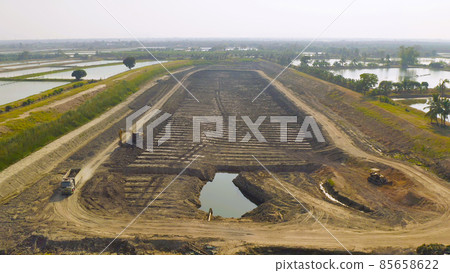 Aerial top view of fresh paddy rice, green agricultural field in countryside or rural area in Asia. Nature landscape background. 85658622