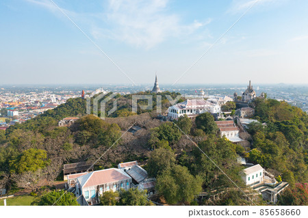 Aerial top view of Phra Nakhon Khiri Historical Park or Khao Wang, Phetchaburi urban city town with forest trees and green mountain hills. Nature landscape background, Thailand. 85658660