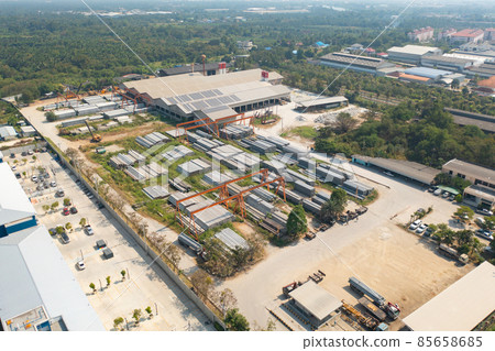 Aerial top view of factory industry. Electricity tower building in energy, transportation, logistic or environment concept. Manufacturing workshop station. 85658685