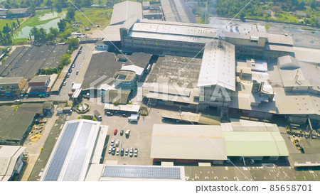 Aerial top view of factory industry. Electricity tower building in energy, transportation, logistic or environment concept. Manufacturing workshop station. 85658701