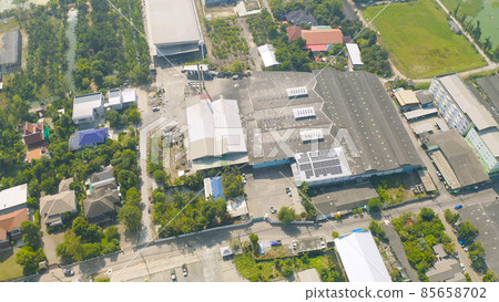 Aerial top view of factory industry. Electricity tower building in energy, transportation, logistic or environment concept. Manufacturing workshop station. Aerial top view of factory industry. Electricity tower building in energy, transportation, logistic or environment concept. Manufacturing workshop station. 85658702
