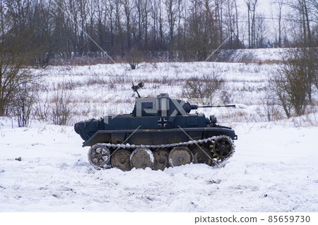 Russia. Saint-Petersburg. Krasnoselsky district. December 12, 2021. Reconstruction of the battle for the liberation of the city of Tikhvin. A light German Luks tank is moving into position. 85659730