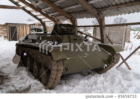 Russia. Saint-Petersburg. Krasnoselsky district. December 12, 2021. The legendary light Soviet T-60 tank is parked under a canopy in the family historical tank park Steel Landing. Russia. Saint-Petersburg. Krasnoselsky district. December 12, 2021. The legendary light Soviet T-60 tank is parked under a canopy in the family historical tank park Steel Landing. 85659733