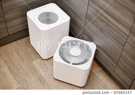 White unassembled air purifier in the kitchen of the apartment 85660147